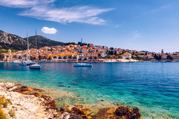 View at amazing archipelago in front of town Hvar, Croatia. Harbor of old Adriatic island town Hvar. Popular touristic destination of Croatia. Amazing Hvar city on Hvar island, Croatia.
