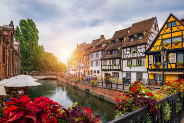 Colmar, Alsace, France. Petite Venice, water canal and traditional half timbered houses. Colmar is...