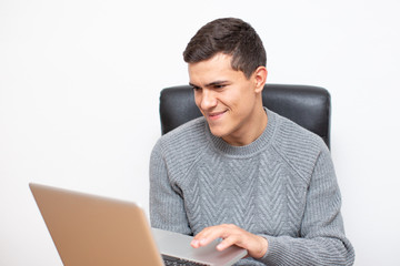 Man working at Computer in his office.