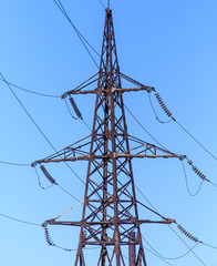 Electric pole against the blue sky