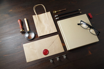 Blank corporate stationery set on wooden background. Branding mock up. Responsive design template.