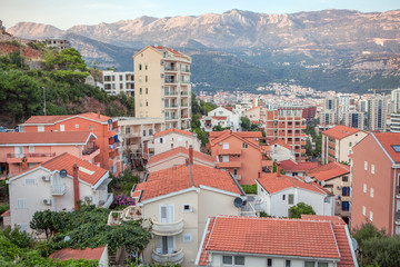 Budva city aerial view of red roofs - Powered by Adobe