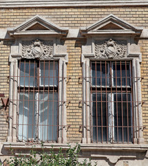 Fototapeta na wymiar Windows of an old building