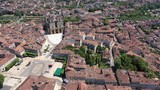 Picturesque summer landscape of French city of Auch on bank of River Gers overlooking Roman Catholic Cathedral and Armagnac Tower