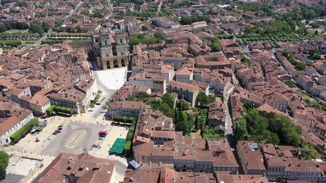Picturesque summer landscape of French city of Auch on bank of River Gers overlooking Roman Catholic Cathedral and Armagnac Tower