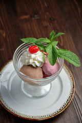 Colored ice cream balls . Restaurant menu