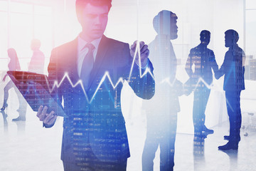 Business leader drawing digital graph in office