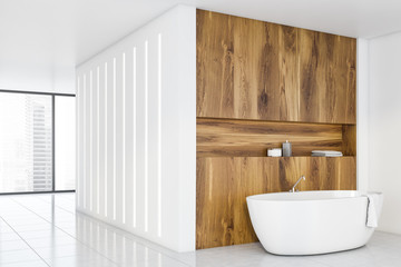 Naklejka na ściany i meble White and light wood bathroom corner with tub