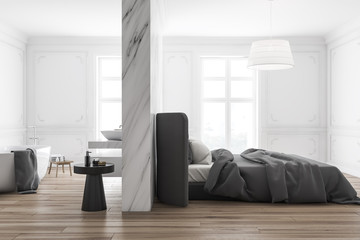 Luxury white master bedroom with bathroom