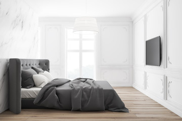 White and marble master bedroom with TV
