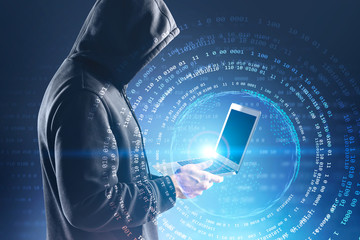Hacker with laptop, digital world hologram
