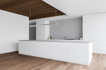 Cozy white and wooden kitchen with countertops