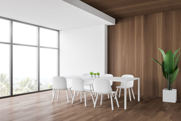 White and wooden dining room interior
