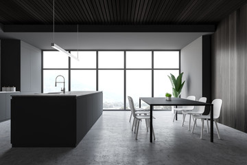 White and gray kitchen with table and island