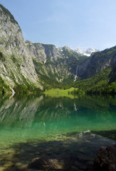 Naklejka na ściany i meble Lake und waterfall in Alps mountain