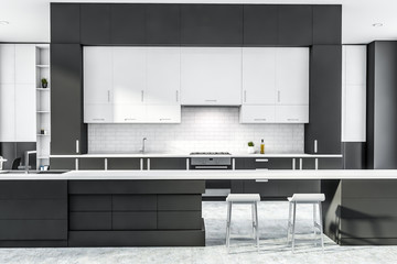 Gray and white kitchen interior with bar