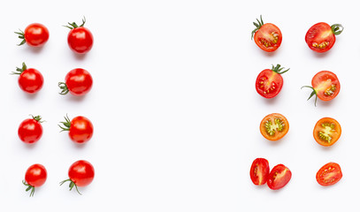 Fresh tomatoes, whole and half cut isolated on white background.