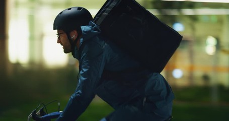 Bike messenger riding through city for delivery