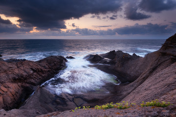 Seascape during sunrise. Beautiful natural seascape. Sea sunrise at the Black Sea coast. Magnificent sunrise with clouds and fire sun at the beginning of September. Rezovo village, Bulgaria