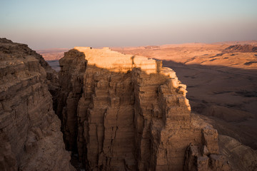 Stone in the valley at sunset