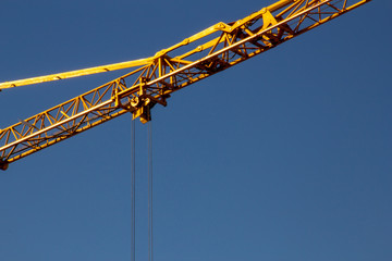 building crane under a blue sky
