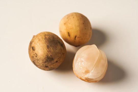 Lansium parasiticum, commonly known in English as langsat or lanzones, is a species of tree in the Mahogany family with commercially cultivated edible fruits. The species is native to South East Asia