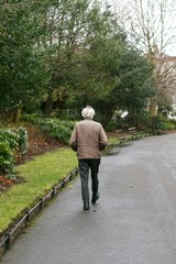 Old man walking in the park