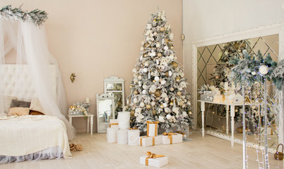 Christmas Room Interior Design, Xmas Tree Decorated By Lights Presents Gifts Toys white and gold, Candles And Garland, mirror