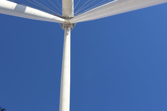 wind power turbine against blue sky