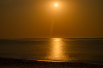Moonrise over the Black Sea, moonlight path on the water. Crimea, Russia.
