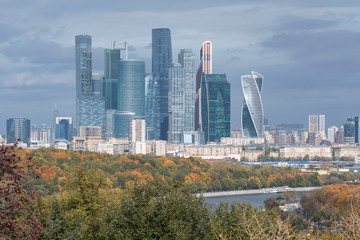 Autumn cityscape. View at Moscow city, business centre of the russian capital, and Moscow river. Moscow, Russia.