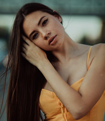Portrait of a woman with loose long hair.