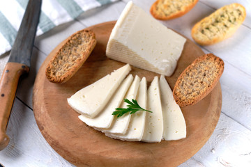 Slices of tender cow cheese