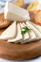 Slices of tender cow cheese