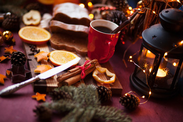 Fototapeta na wymiar christmas hot mulled wine with cinnamon cardamom and anise on wooden background