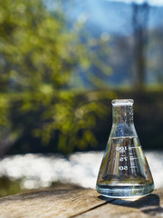 Glass flask with clean drinking water.