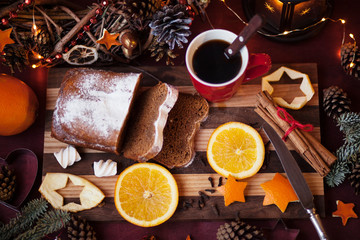 christmas hot mulled wine with cinnamon cardamom and anise on wooden background