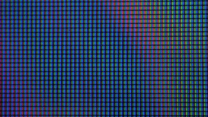 LCD screen pixels. Macro Shot Of Computer Screen, Pixels Texture. Abstract Blue Background. Close up LED Display With Color Shades  technology. Closeup Monitor. Pattern Wallpaper Illuminations.