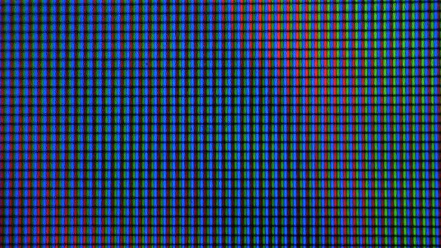 LCD screen pixels. Macro Shot Of Computer Screen, Pixels Texture. Abstract Blue Background. Close up LED Display With Color Shades  technology. Closeup Monitor. Pattern Wallpaper Illuminations.