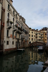 Obraz na płótnie Canvas Venice urban architecture with canals and bay