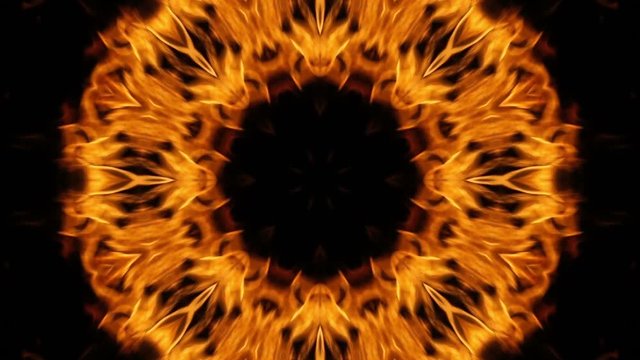 Kaleidoscope background of burning fire. Abstract background, orange-black color. Unique kaleidoscope flame design.