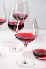 Fotobehang Red wine in different glasses © Mallivan