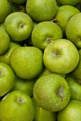 green apples on black background