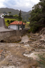 Fototapeta na wymiar River and a house in the nature, Furnas, Azores