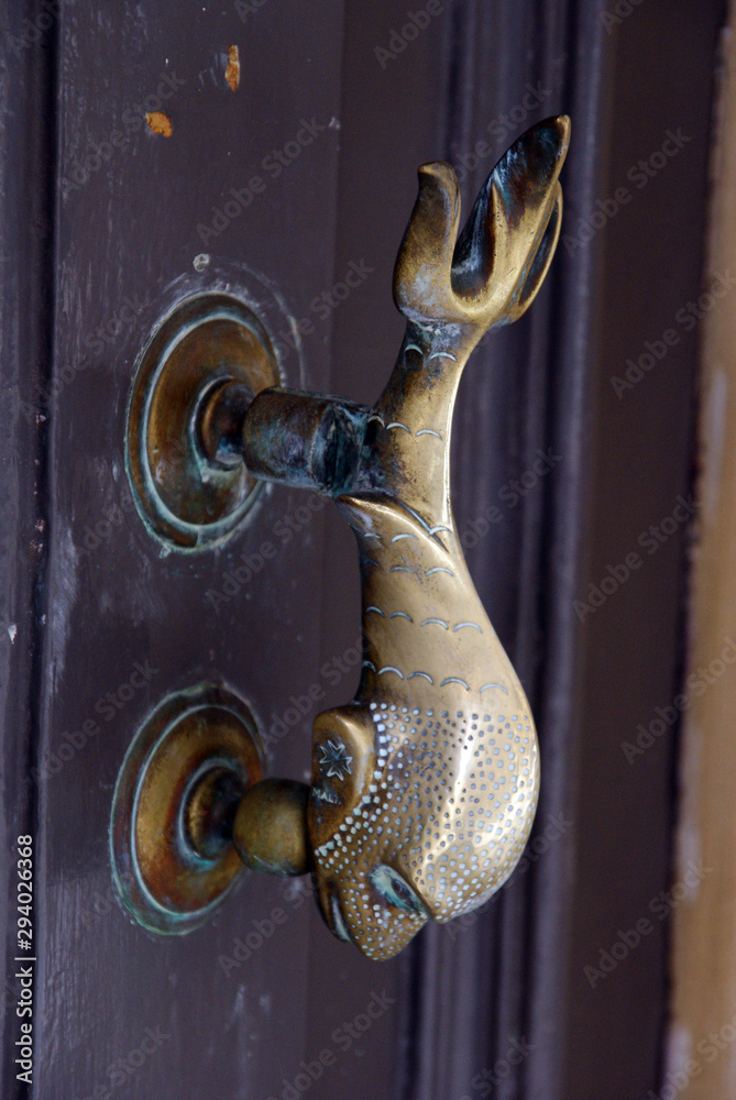 Wall mural unusual and antique door handles of malta