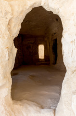 The entrance  to remains of residential buildings near to the Nabataean city of Avdat, located on the incense road in the Judean desert in Israel. It is included in the UNESCO World Heritage List.
