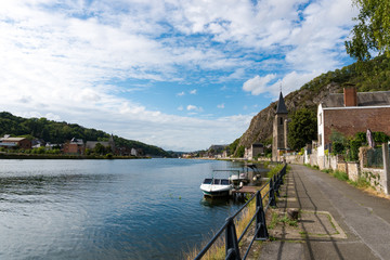 Obraz premium view of the Saint Paul-des-Rivages church and the river Meuse in Dinant