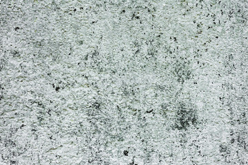 Texture of a concrete wall with cracks and scratches which can be used as a background