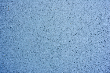 Texture of a concrete wall with cracks and scratches which can be used as a background