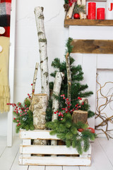 Natural Christmas decorations in white interior